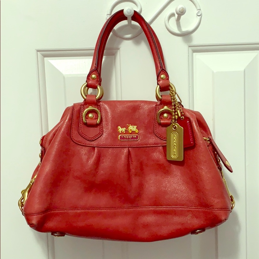 Small red Coach hand bag.